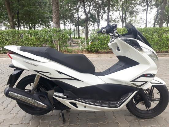 Bán xe Honda PCX 2014 Fi trắng, chính chủ, xe quá mới